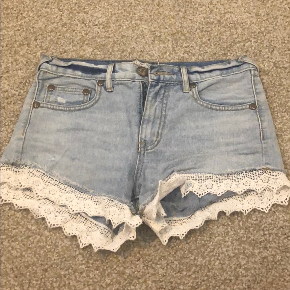 Free people lace trimmed denim shorts